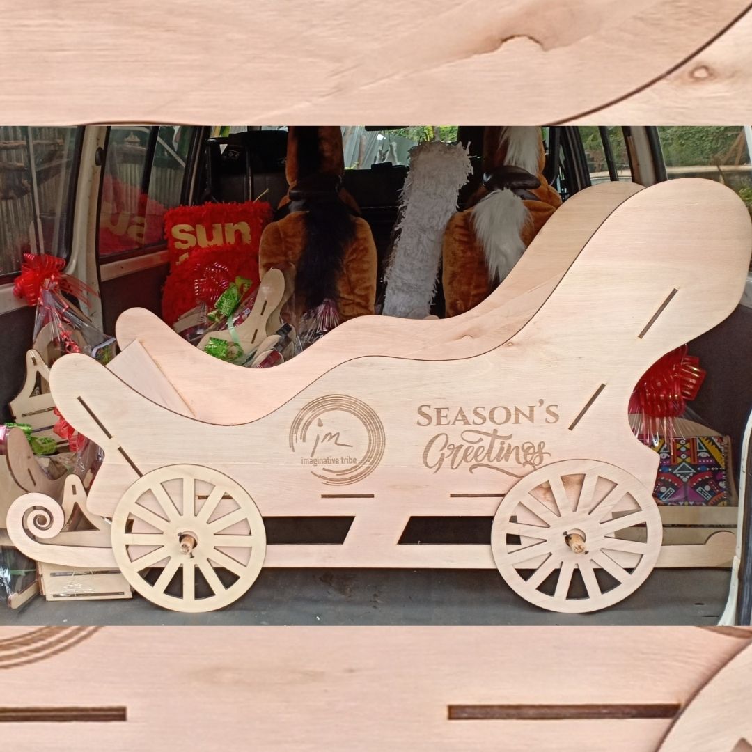 Precious Giftz branded wooden sleigh gift box on wheels